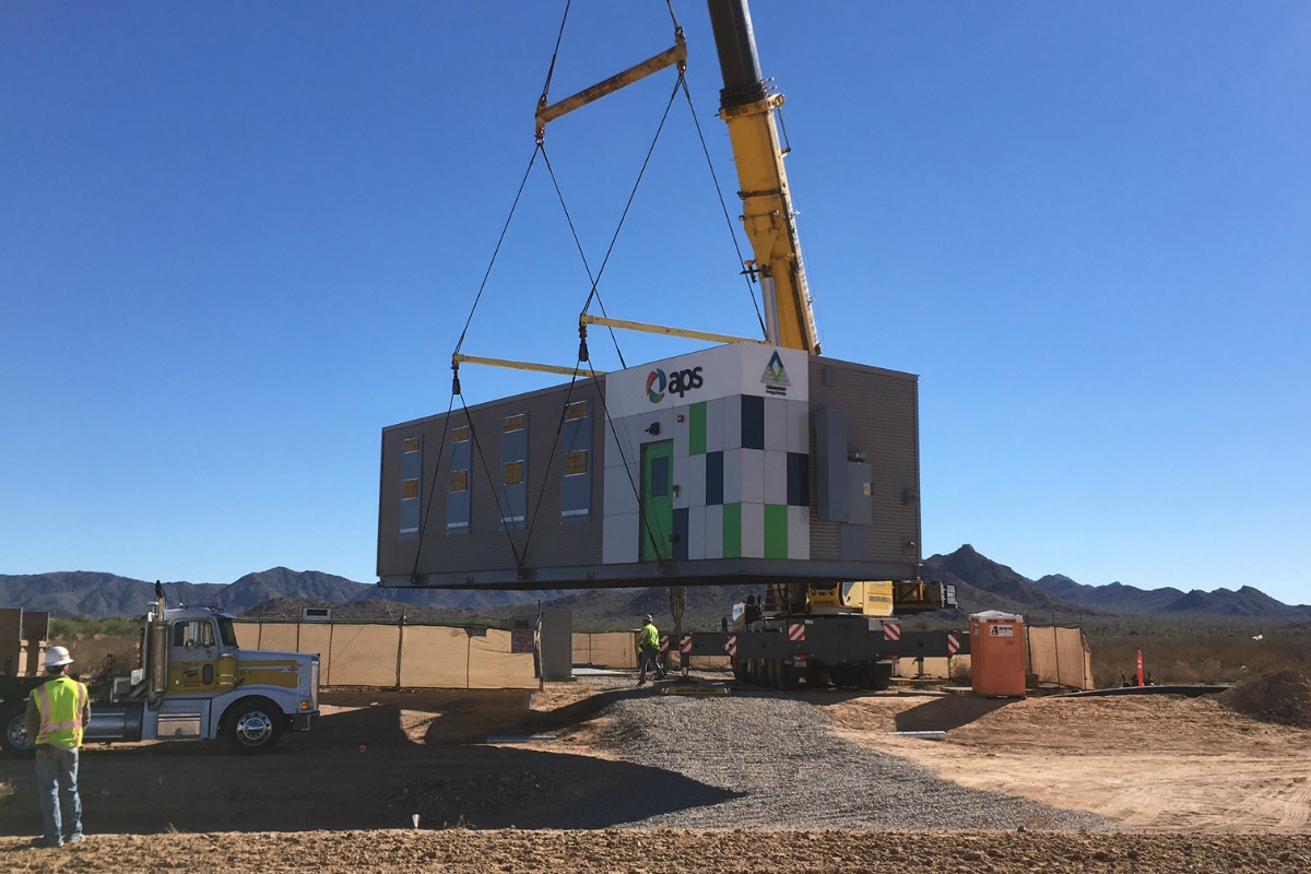 The energy storage arrays are lowered onto the Arizona desert