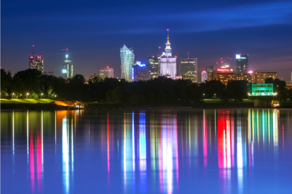 Warsaw lit up by night.  Poland plans to increase renewables energy ratio in its power system