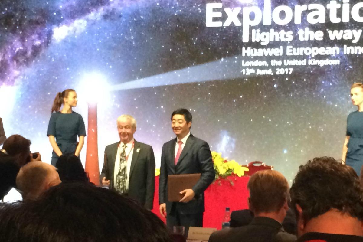  Sir Timothy O'Shea (left) and Ken Hu at the signing of the new partnership