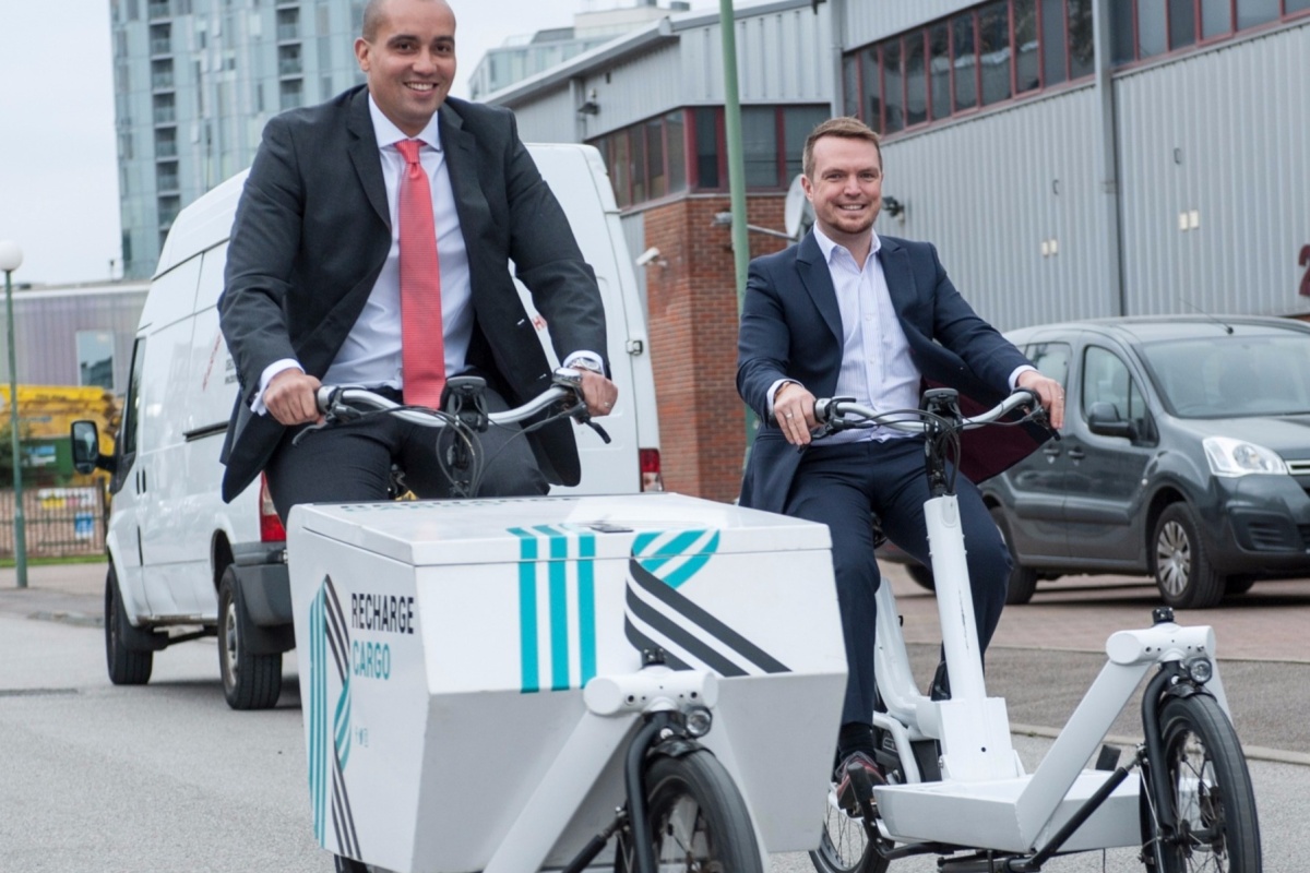 Councillor Sizwe James and Sharing Cities' Nathan Pierce trying out the new cargo bikes