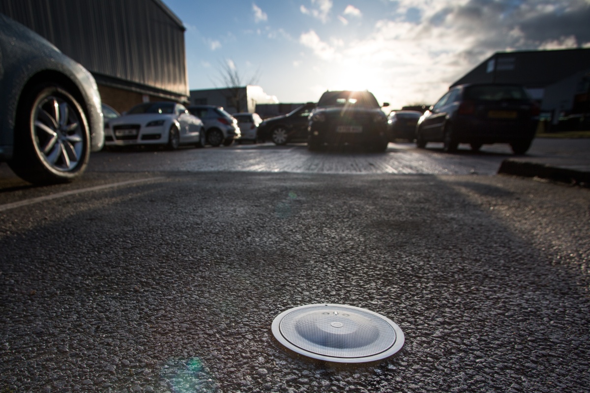 The detection sensors send data to the SmartCloud parking system