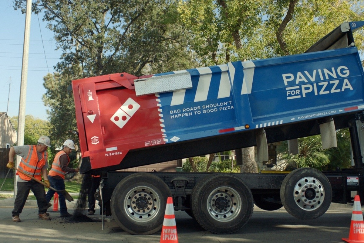 Domino's has already worked with four municipalities to aid road repair