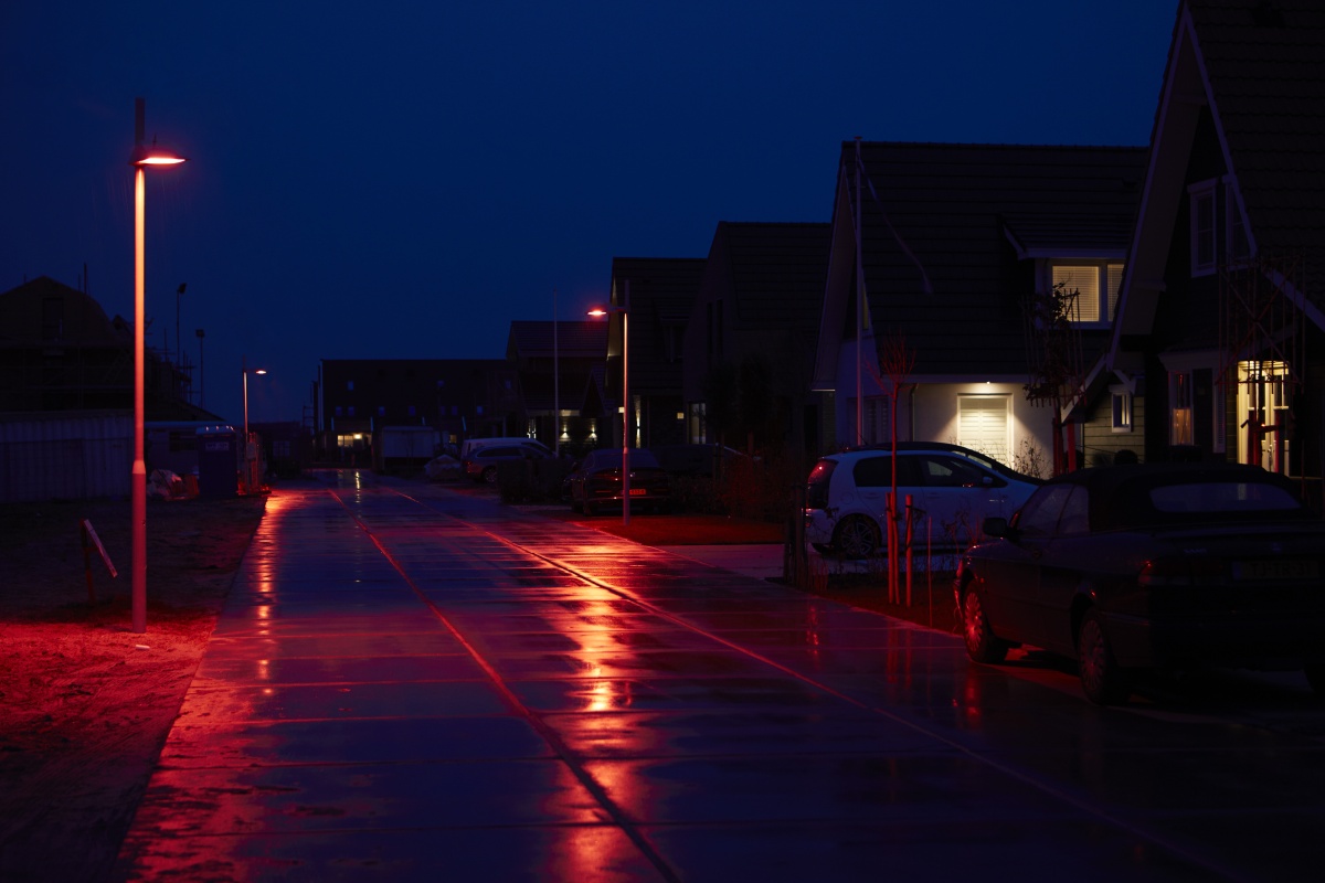 The special red lighting recipe illuminates the road for residents in the town