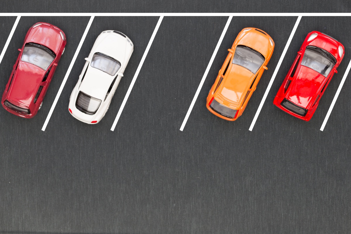 The solution monitors parking usage in real-time while collecting data