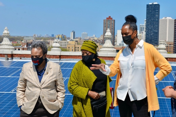 Lesley Showers briefs mayor and Blacks In Green founder Naomi Davis on GreenRise's solar