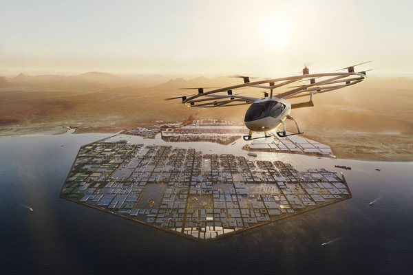 Rendering of a Volocopter aircraft flying over the Oxagon industrial centre at Neom