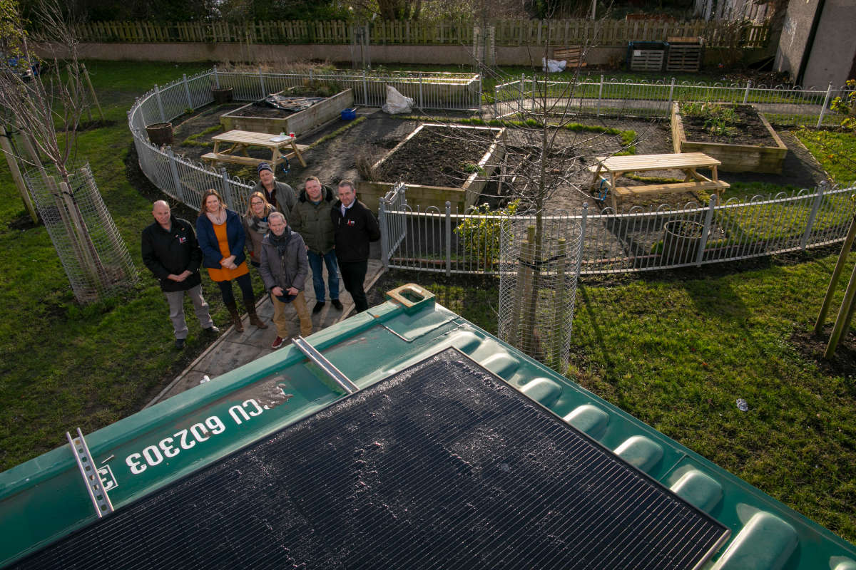 JGM join volunteers, ward Cllr Sanne Dijkstra-Downie, Council officer George Norval and Adrienne Mee from Fresh Start at the solar powered community growing area (Credit: City of Edinburgh Council)