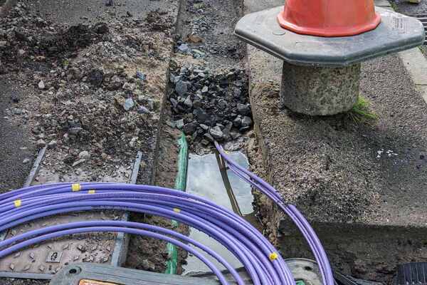 purple fibre-optic cable work_smart cities_Adobe.jpg