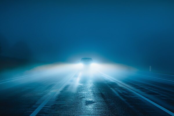 dark_road_with_car_lights_smart_cities_Adobe.jpg