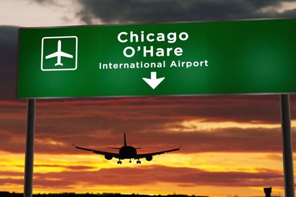 oHare_Airport_sign_with_plane_landing_smart_cities_Adobe.jpg
