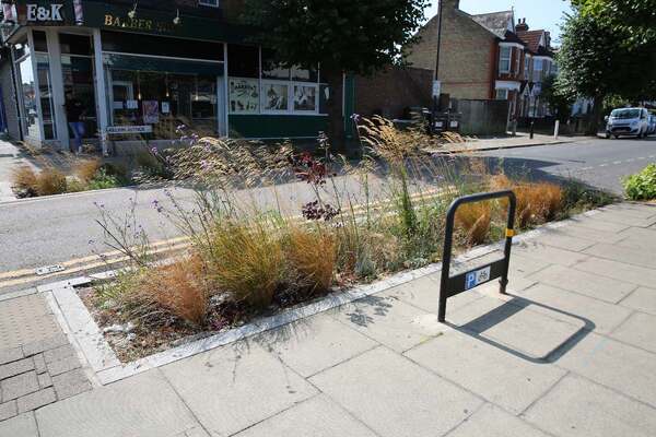 Developing a market based approach to deliver SuDS through street works Green Lanes smart cities P