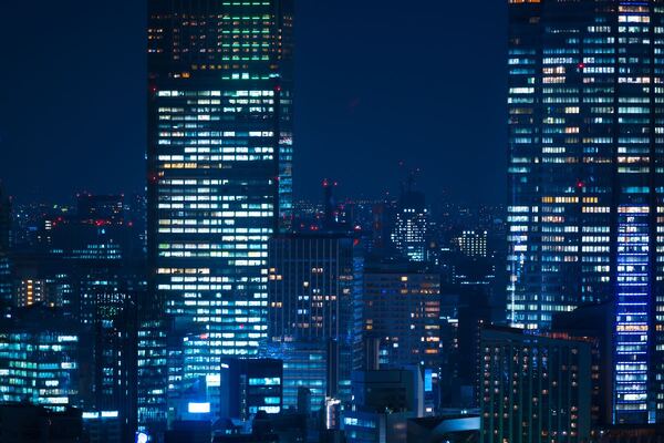 city buildings at night smart cities Adobe
